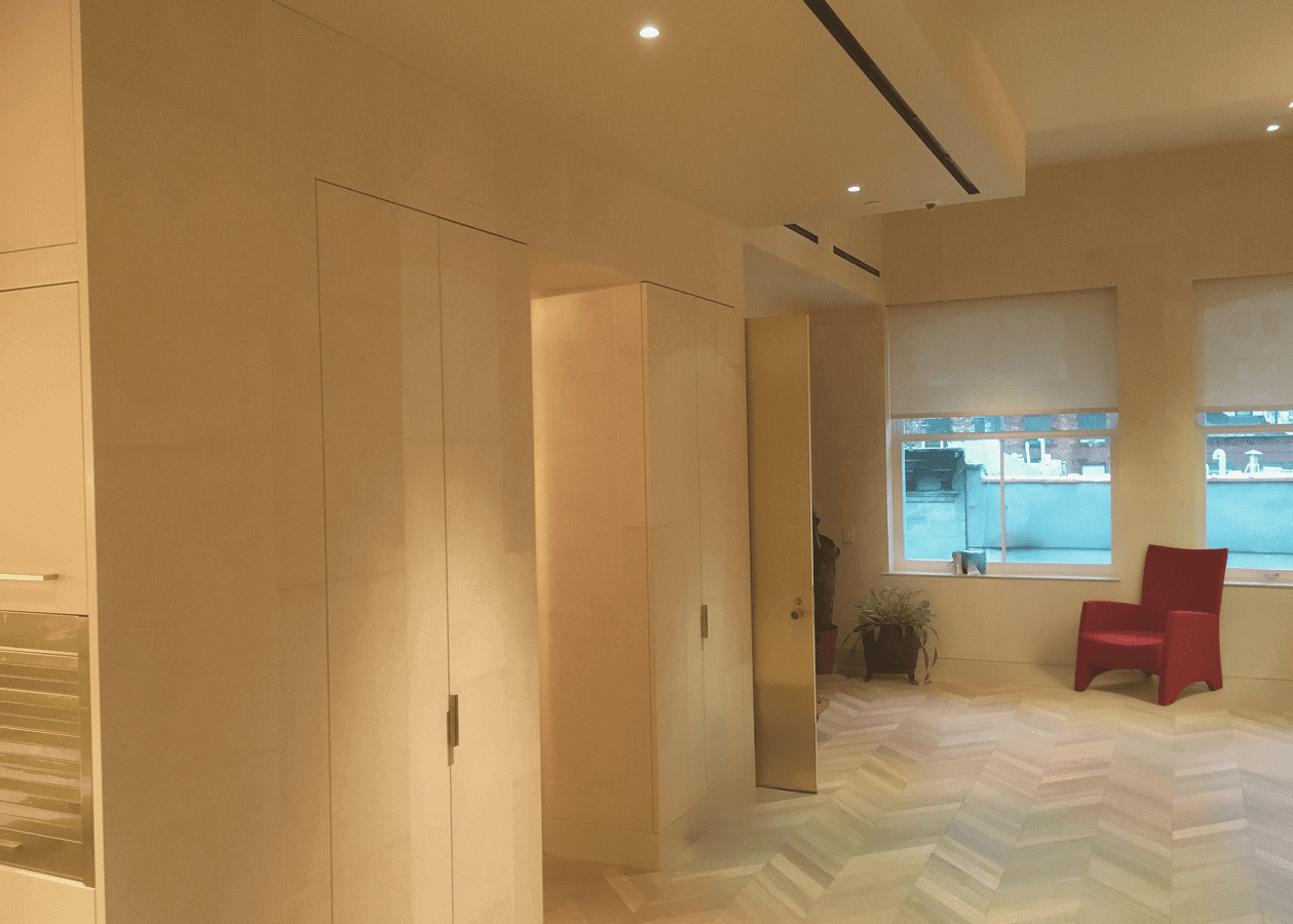 Modern wooden wardrobe with open compartments in a stylish room.