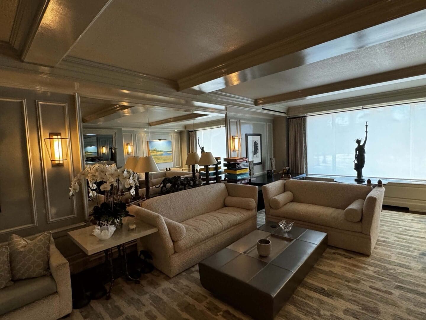 Elegant living room with neutral tones and modern decor.