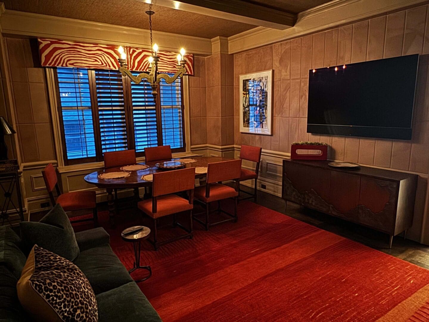 Cozy living room with warm lighting and modern decor.